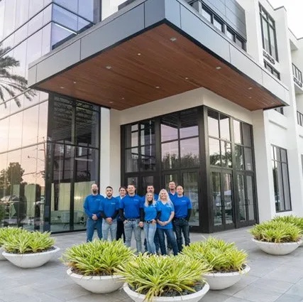 A-1 Affordable Plumbing team standing in front of recently completed commercial project